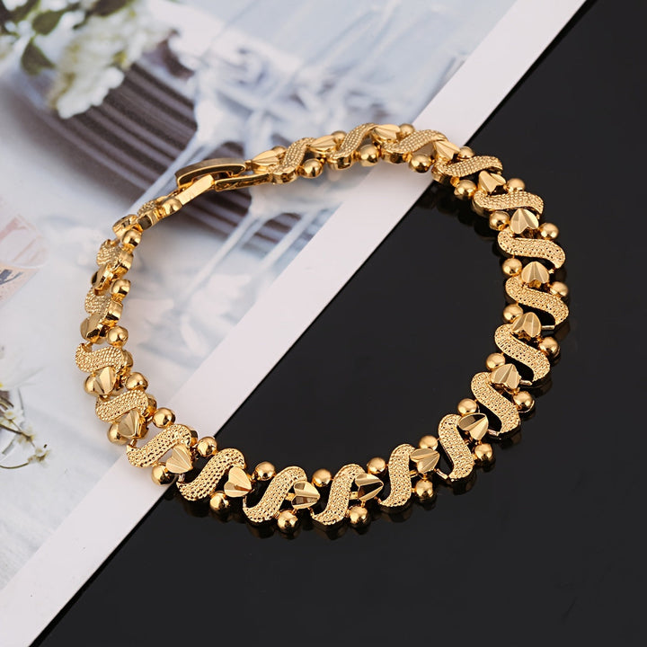 Lily Ornate Wave Bracelet | Guld