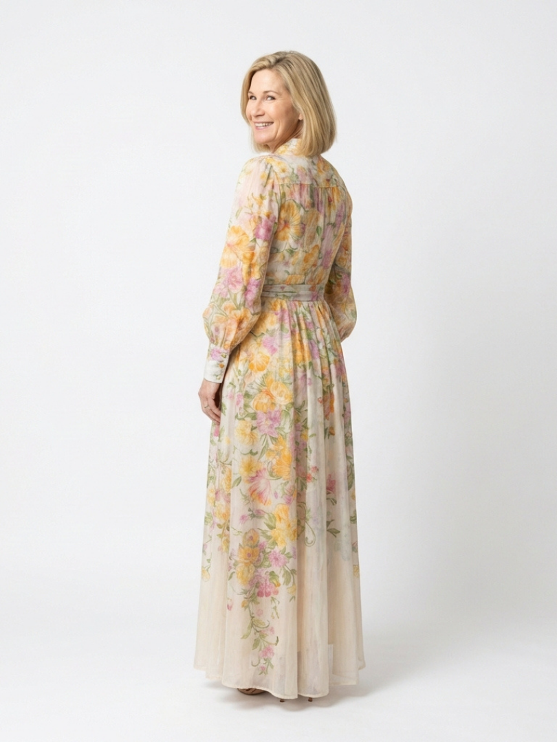 Cressida | Maxiklänning med blommönster och transparenta långärmar